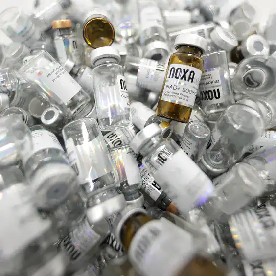 Medical vaccine vials and syringes for immunization and health protection.
